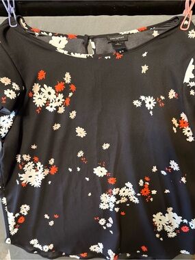 Ann Taylor Black Scoop Neck Floral Top with White and Red Blooms.